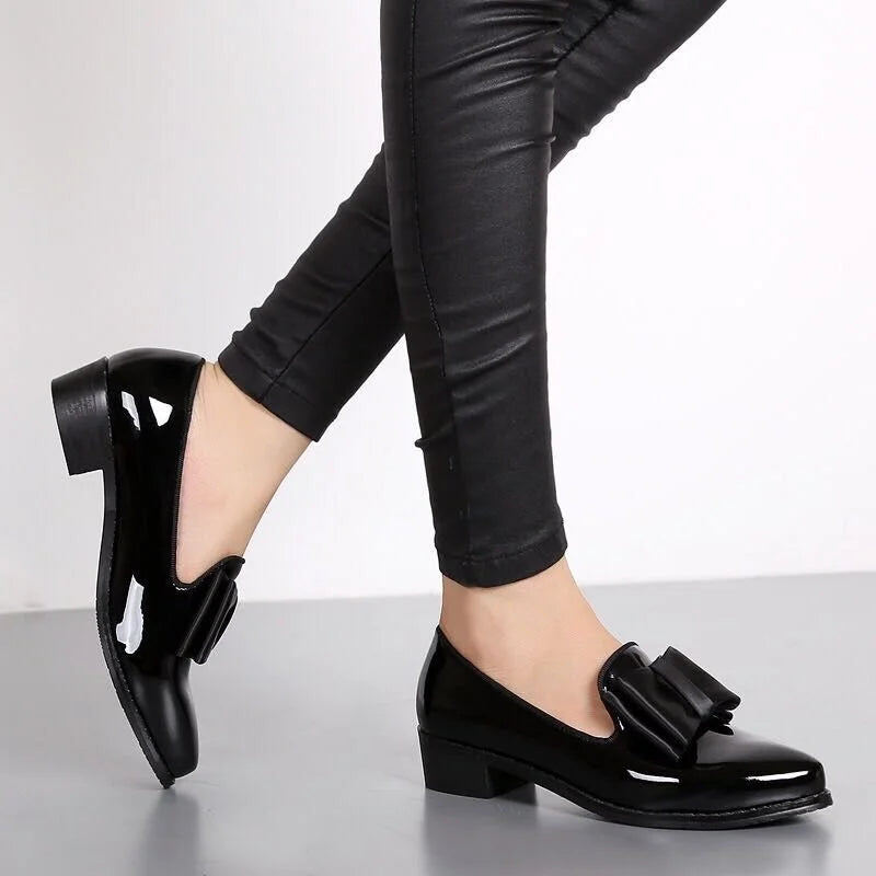 Glossy Black Flats for Women – Chic Slip-On Design with Bow Accent