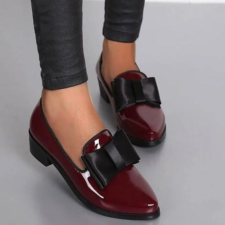 Glossy Black Flats for Women – Chic Slip-On Design with Bow Accent